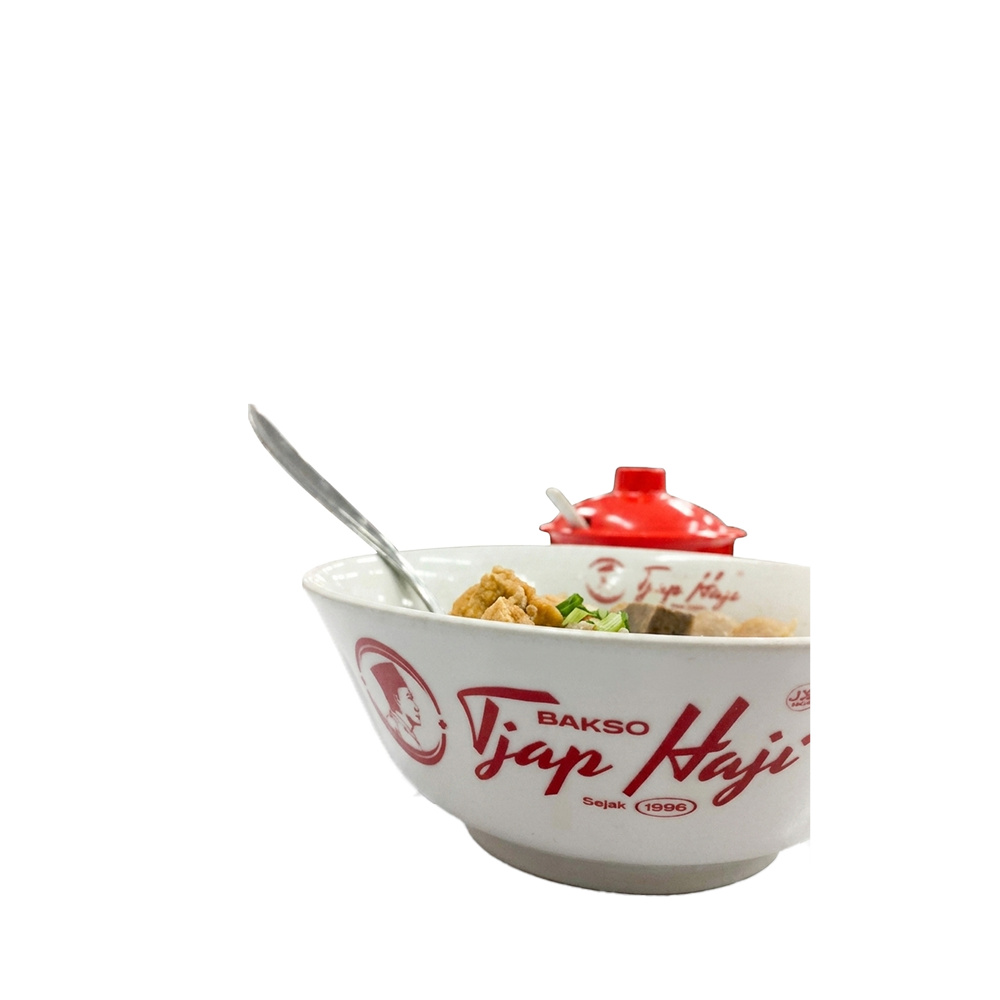 Mangkuk besar bakso Tjap Haji lengkap dengan tutup merah dan sendok